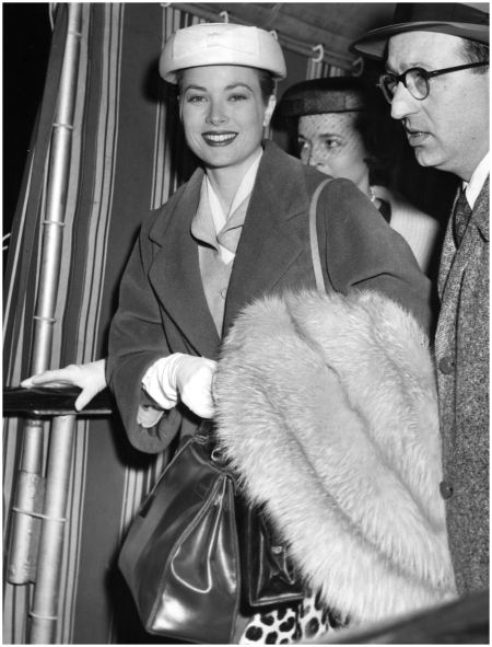 Grace Kelly with her namesake Kelly bag by Hermes.