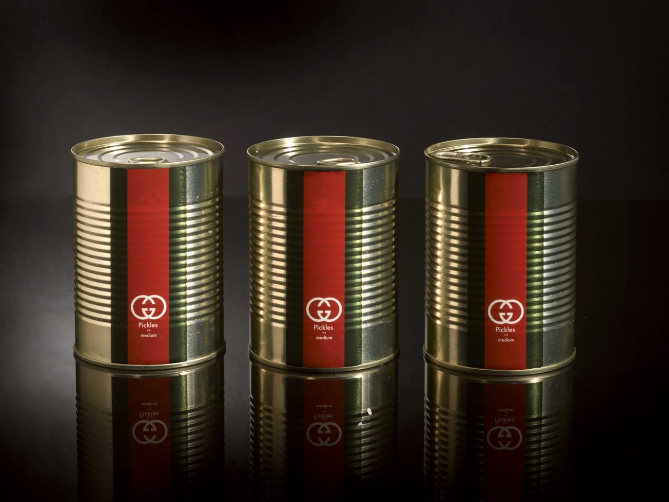 Cans of Gucci-brand pickles.