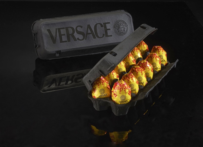 A carton of individually-wrapped Versace eggs.