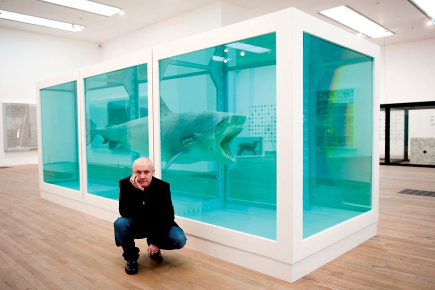 Damien Hirst with his most famous work, The Physical Impossibility of Death in the Mind of Someone Living